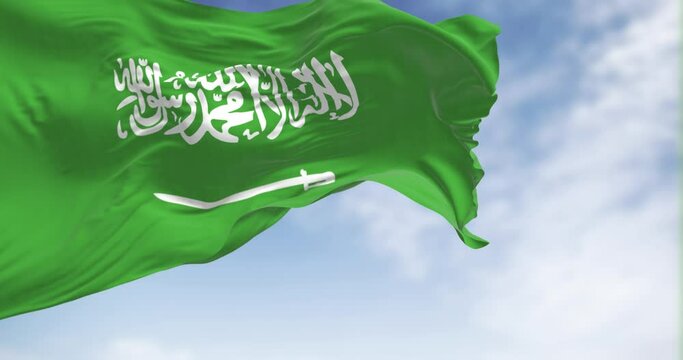 Saudi Arabia national flag waving in the wind on a clear day