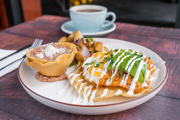Delicious Mexican breakfast with poached eggs and beans