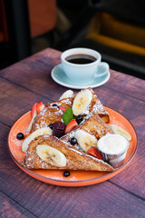 Delicious and spongy french toast with red berries