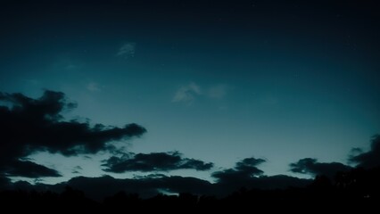 Fototapeta na wymiar Clouds in the night sky. Black blue skies.