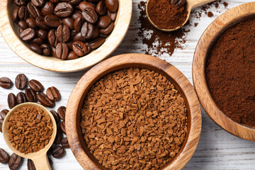Instant, ground coffee and roasted beans on white wooden table, flat lay