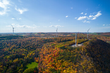 Aerial view on wind turbines during autumn time in New York