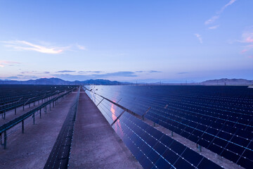 Solar panels in fabolous Mountain place. Aerial view of beutifule landscape in Nevada during sunset.