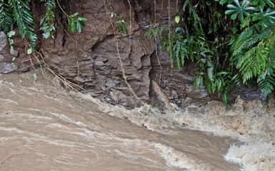 erosion of river bank sides in fast flow