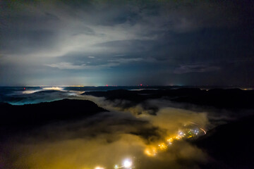 Aerial viea of mountains in Kentucky. Beutifule view of mountains in fog at night.