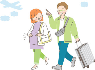 里帰り出産する妊婦さんと荷物を持つ夫