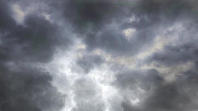 view of lightening and clouds over the stormy sky