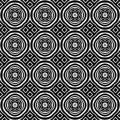 Seamless pattern of black shapes on white background.