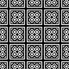 
Seamless pattern of black shapes on white background.