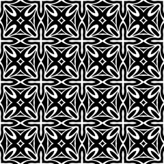 
Seamless pattern of black shapes on white background.