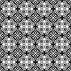 Seamless pattern of black shapes on white background.