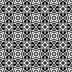 Seamless pattern of black shapes on white background.