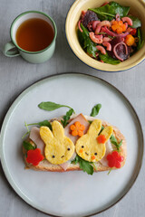 Healthy living during the holiday seasons. Healthy Breakfast of Ham Sourdough Bread with Fresh Salad and English oor Chinese Tea