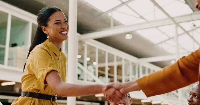 Handshake, women and business collaboration with management, teamwork and trust in office. Happy employees shaking hands for support, networking and b2b consulting, hiring deal or partnership success