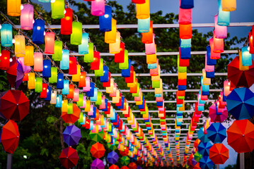 Bright colorful lanterns hanging in the evening
