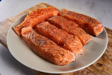 Season salmon steaks