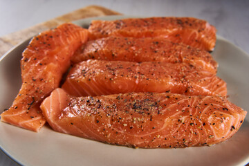 Season salmon steaks