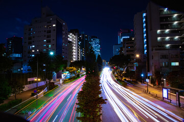 A night traffic jam at the city crossing in Tokyo wide shot