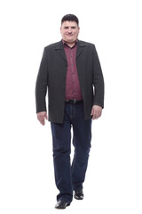 Mature man in business suit striding forward.