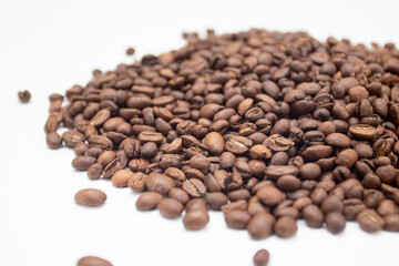 Coffee beans on white background. Fresh roasted coffee beans