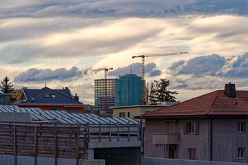 Highway enclosure construction site at City of Zürich district Schwamendingen with apartment buildings on a cloudy autumn afternoon. Photo taken November 17th, 2022, Zurich, Switzerland.