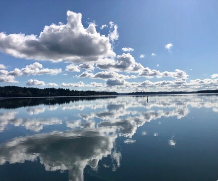 Clouds reflected in water, Silverdale, WA © Kevin