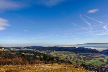 Fototapeta na wymiar view to dense fog at the horizon with blue sky and sunshine