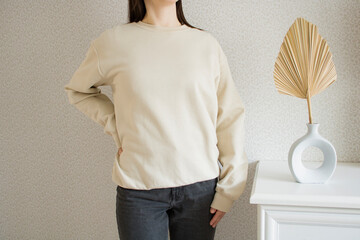 Sand sweatshirt mockup with palm leaf. Female wear plain
