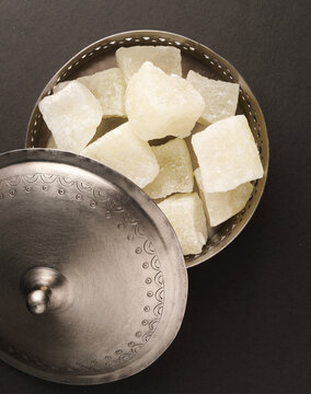 Indian Sweet Petha Also Know As Agra Petha, Peda, is a popular Indian sweet. It is soft chewy and candy-like, eaten dry or dipped in sugar syrup chashni  It is know to have originated in Agra.