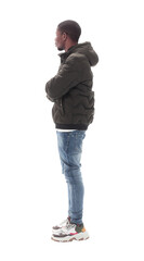 Naklejka premium side view. casual guy in jeans looking at copy space