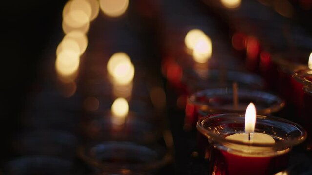 Red Wish and Pray Candles in a Catholic Church