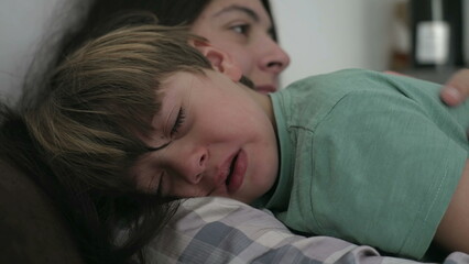 Tearful crying child. Mother consoling sad little boy. Kid in crisis cries