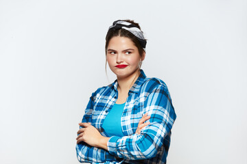 Thoughtful Woman Pondering At Studio. Serious Girl Thinking Serious Issues, Looking With Uncertain Expression, Making Difficult Choice. Indoor Studio Shot Isolated