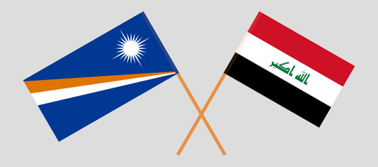 Crossed flags of Marshall Islands and Iraq. Official colors. Correct proportion