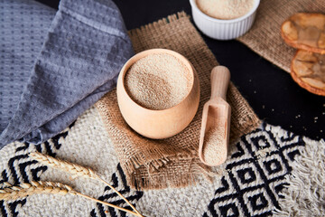 Amaranth porridge - super food. Natural background. Healthy breakfast, natural cotton and wood cutlery