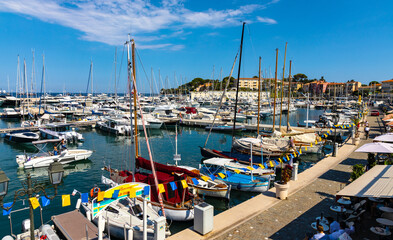 Port and yacht marina at Saint-Jean-Cap-Ferrat resort town on Cap Ferrat cape at French Riviera of Mediterranean Sea in France