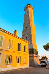 Fototapeta premium Le Phare Lighthouse at southern rocky shore of Cap Ferrat cape at French Riviera of Mediterranean Sea in France