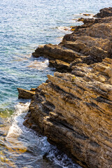 Rocky shoreline landscape of Saint-Jean-Cap-Ferrat resort town on Cap Ferrat cape at Azure Coast French Riviera of Mediterranean Sea in France