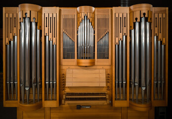 Small classical wooden church pipe organ isolated