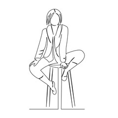 girl sitting on a bar stool