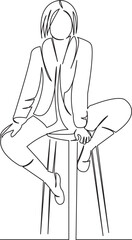 girl sitting on a bar stool