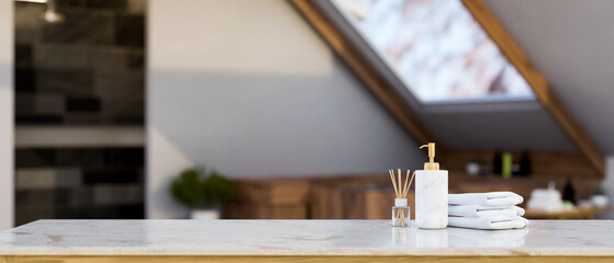 Copy space on white marble tabletop over blurred background of minimal bathroom.