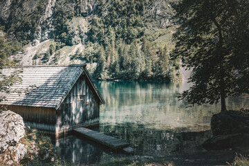 wooden boat house in the mountains of bavaria