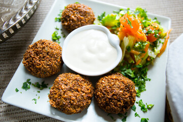 Faláfel or falafel​ is a chickpea or broad bean croquette. It is usually consumed in the Middle East.