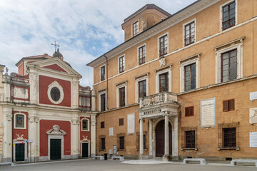 Fototapeta na wymiar The ancient church of San Giovanni Decollato and the Town Hall, Piazza Mercurio square, Massa, Italy
