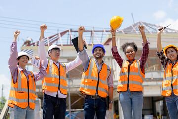 Team Construction or engineering group and worker. Teamwork and determination to succeed. Safety...