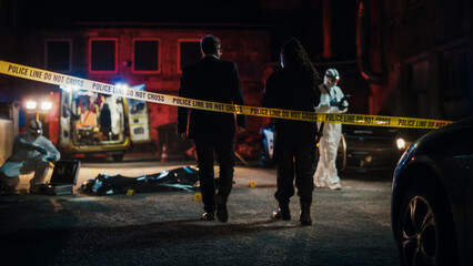 Cinematic Shot: Lieutenant Arriving At a Crime Scene, Crossing the Yellow Tape, Listening to...