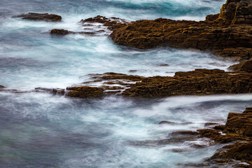 Waves at the cliffs at the coast of ireland