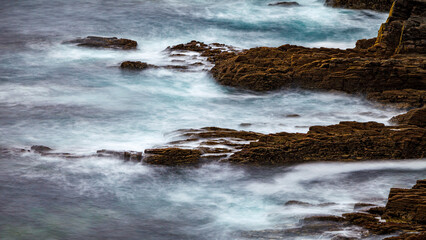 Waves at the cliffs at the coast of ireland