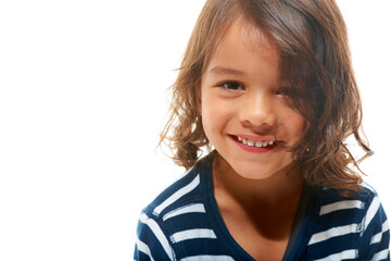 Child, portrait and smile of a boy child with isolated white background in studio with mockup. Happiness, face and youth of a young toddler happy with mock up space looking positive and cheerful